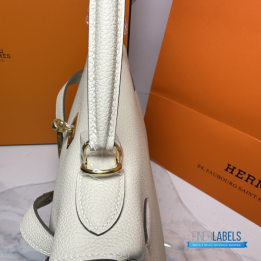 QC Hermès Mini Kelly Sellier in a light color