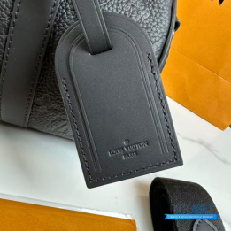QC LV Keepall Bandoulière 25 crafted in black embossed monogram leather with matching dark hardware