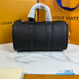 QC LV Keepall Bandoulière 25 crafted in black embossed monogram leather with matching dark hardware