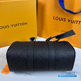 QC LV Keepall Bandoulière 25 crafted in black embossed monogram leather with matching dark hardware