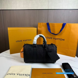QC LV Keepall Bandoulière 25 crafted in black embossed monogram leather with matching dark hardware
