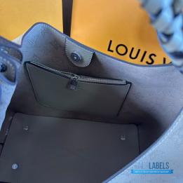 QC LV Carmel Mahina Hobo Bag crafted from perforated Mahina calfskin