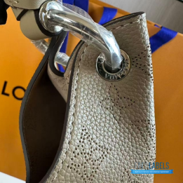 QC LV Carmel Mahina Hobo Bag crafted from perforated Mahina calfskin