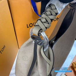 QC LV Carmel Mahina Hobo Bag crafted from perforated Mahina calfskin