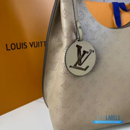 QC LV Carmel Mahina Hobo Bag crafted from perforated Mahina calfskin