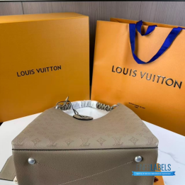 QC LV Carmel Mahina Hobo Bag crafted from perforated Mahina calfskin