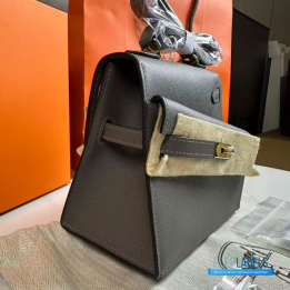 QC Hermès Kelly 20 cm Désordre handbag in a grey shade
