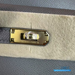 QC Hermès Kelly 20 cm Désordre handbag in a grey shade