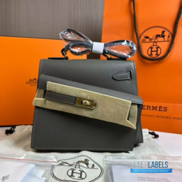 QC Hermès Kelly 20 cm Désordre handbag in a grey shade